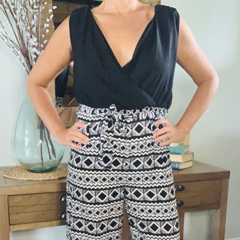 Long wide leg jumpsuit. Super cute!